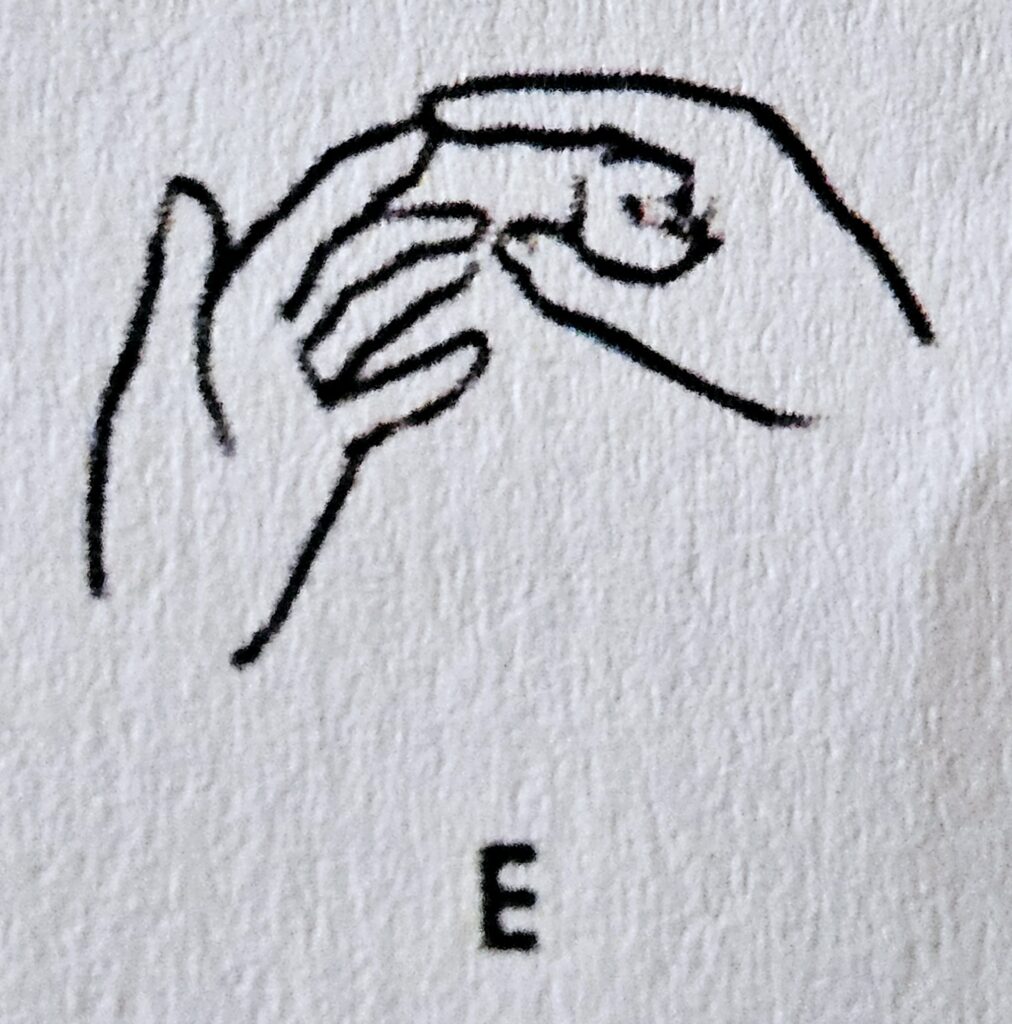 The letter E in Makaton