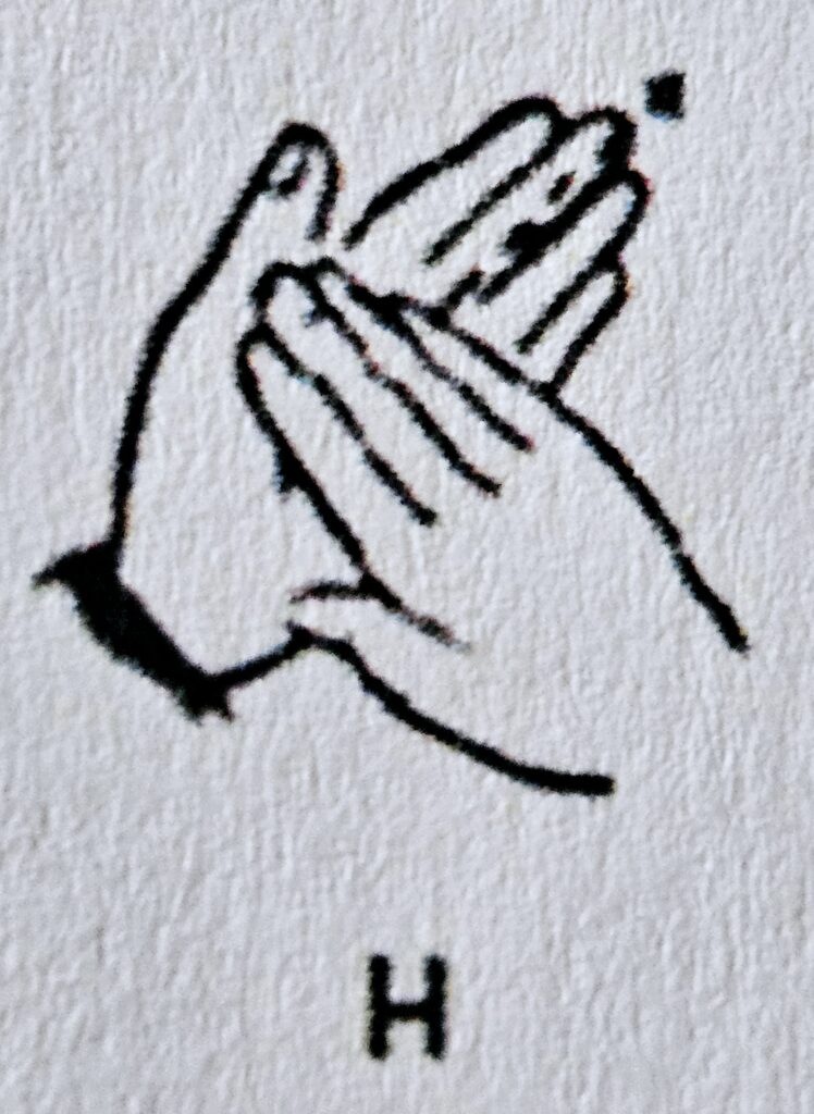 The letter H in Makaton