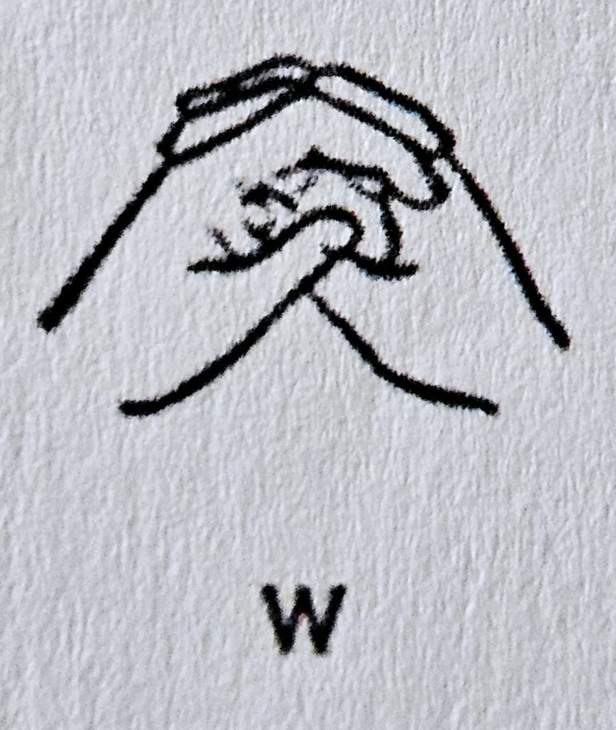 The letter W in Makaton
