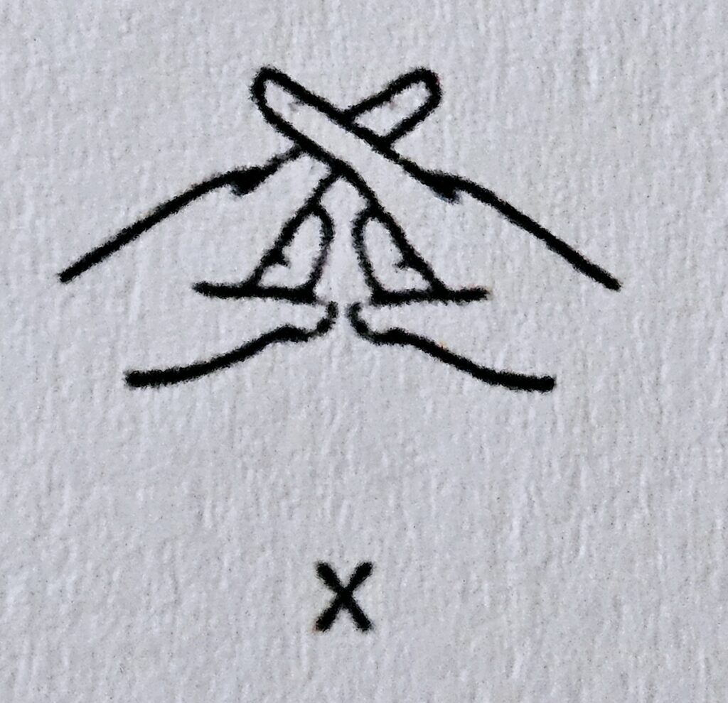 The letter X in Makaton