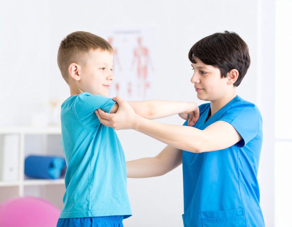 A young boy with dystonia being assessed by a female clinician